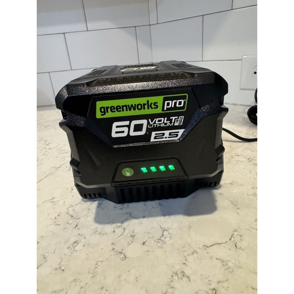 Greenworks Pro 60v Lithium Li-Ion 2.5 Battery  & Charger.  Charges FULL